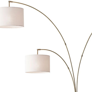 Homeroots 74" Brass Three Light Arc Floor Lamp With Off White Fabric Drum Shade Brass Metal 372712