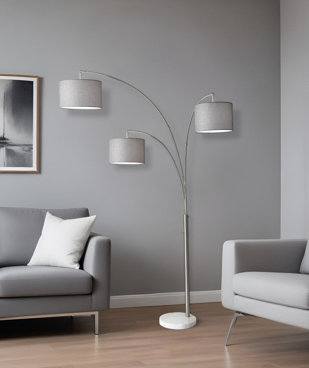 HomeRoots 74" Elegant Three-Light Arc Floor Lamp with White Marble Base and Textured Off-White Drum Shades Brushed Steel 372713