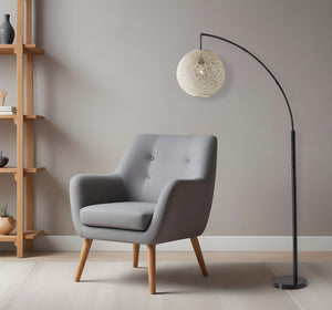 Homeroots 77" Antiqued Bronze Arched Floor Lamp With Groovy Beige Abstract Wicker Globe Shade  Metal 372727