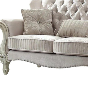 HomeRoots 69" Chesterfield Loveseat with Elegant Button-Tufting and Plush Toss Pillows for Timeless Style Ivory 374220