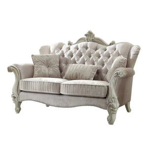 HomeRoots 69" Chesterfield Loveseat with Elegant Button-Tufting and Plush Toss Pillows for Timeless Style Ivory 374220