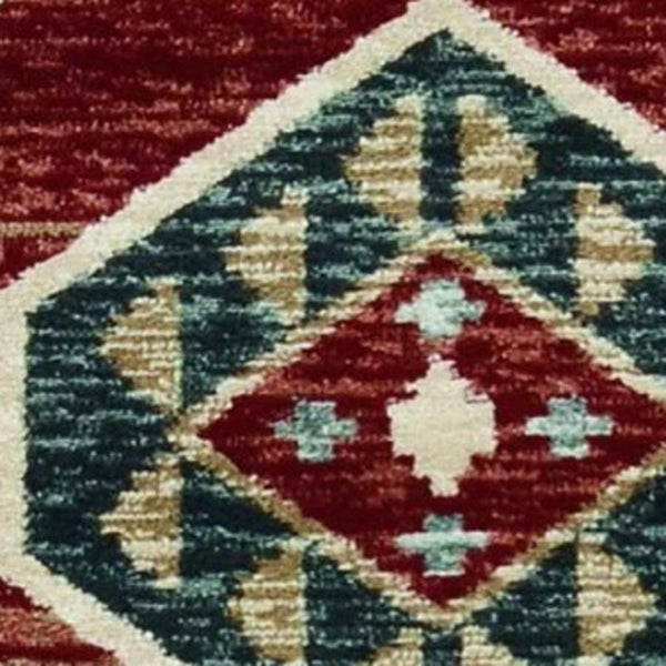 HomeRoots 7' Vibrant Red and Blue Geometric Round Area Rug - Durable, Stylish Design for High-Traffic Spaces 5' X 8' 374402