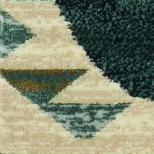 HomeRoots 8' Southwestern Round Rug in Ivory and Blue – Durable, Stain-Resistant, Ideal for High-Traffic Areas 5' X 8' 374410