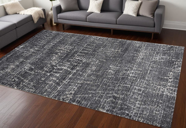 HomeRoots 9' Gray and Dark Gray Abstract Distressed Area Rug – Contemporary Style for Family Rooms and Dining Areas 9' X 13' 374757
