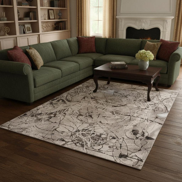 HomeRoots 10' Gray and Ivory Area Rug - Elegant Machine-Made Design for Cozy Comfort in Any Living Space 10' X 13' 374780