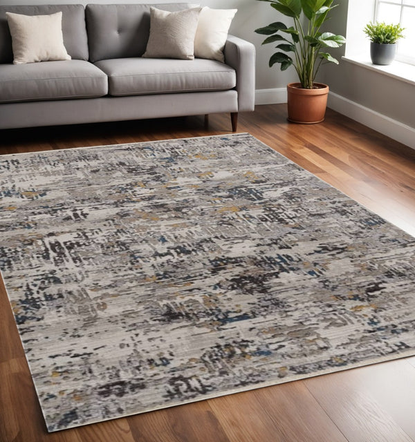 HomeRoots 5' Gray Black and Gold Abstract Distressed Area Rug for Modern Elegance in High-Traffic Spaces 5' X 8' 374818