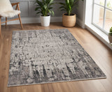 Homeroots 4' X 6' Ivory Grey Machine Woven Shrank Abstract Industrial Style Indoor Area Rug  Polyester 374823