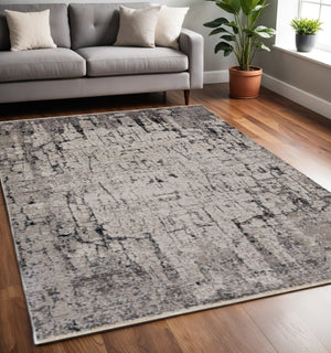 HomeRoots 4' Abstract Distressed Area Rug in Ivory and Gray – Soft, Durable, and Stylish for Any Space 5' X 8' 374824