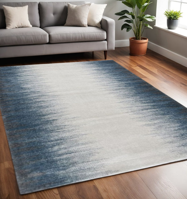 HomeRoots 3' Elegant Ivory and Blue Abstract Area Rug - Soft, Durable Design for Modern Living Spaces 5' X 8' 374855