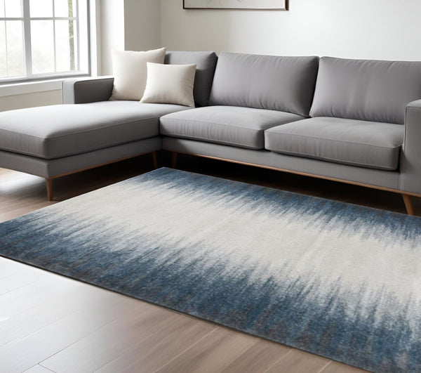 HomeRoots 8' Ivory and Blue Abstract Area Rug - Modern Elegance for Living Spaces, Stain-Resistant Comfort 8' X 11' 374856