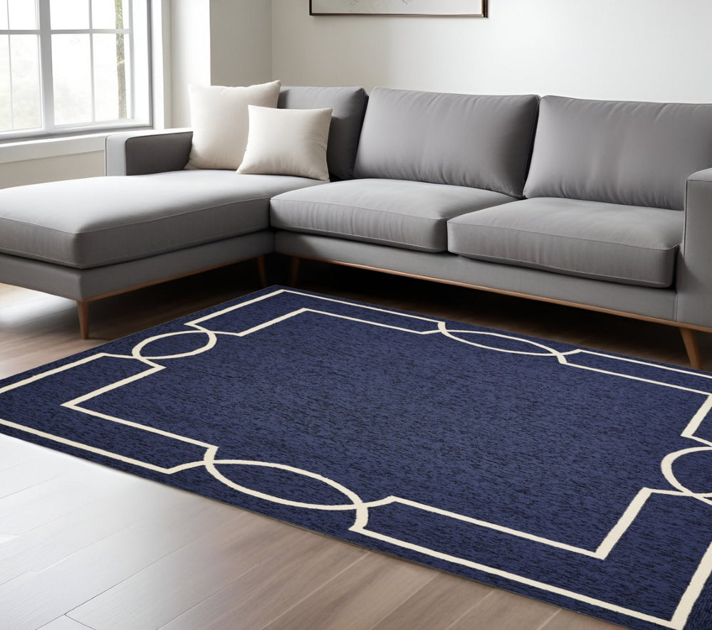HomeRoots 7' Handcrafted Blue and Ivory Geometric Area Rug - Perfect Focal Point for Modern Living Spaces 7' X 10' 374940