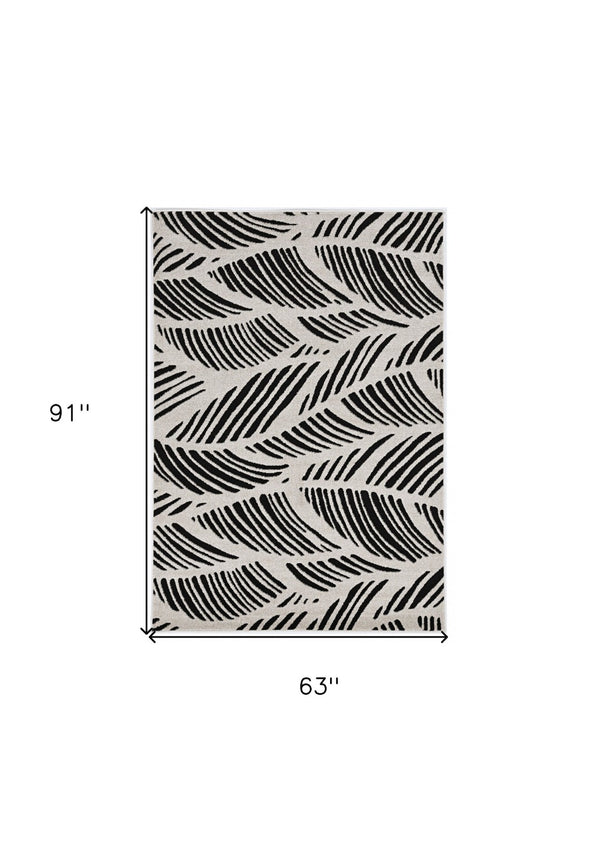HomeRoots 5' Black and White Abstract Area Rug - Stylish Indoor/Outdoor Decorative Accent for High-Traffic Spaces 5' x 8' 375010