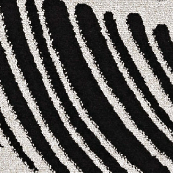 HomeRoots 5' Black and White Abstract Area Rug - Stylish Indoor/Outdoor Decorative Accent for High-Traffic Spaces 5' x 8' 375010
