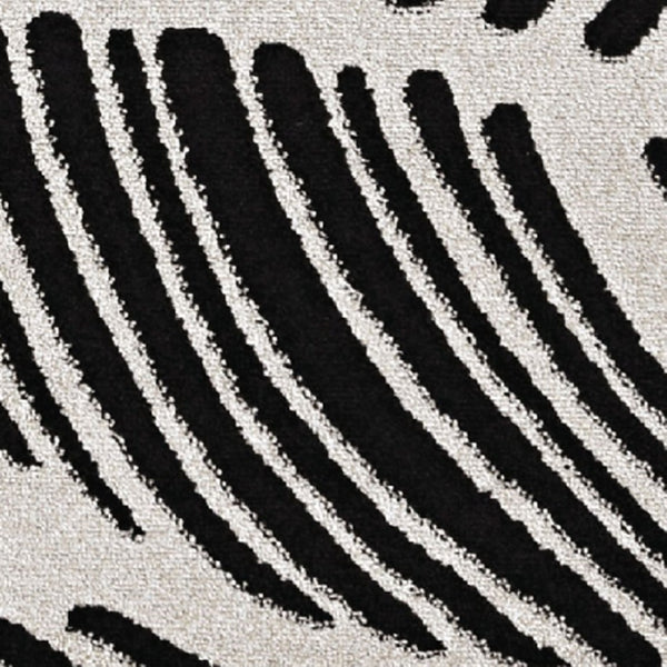 HomeRoots 5' Black and White Abstract Area Rug - Stylish Indoor/Outdoor Decorative Accent for High-Traffic Spaces 5' x 8' 375010