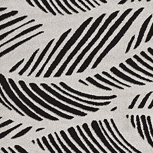 HomeRoots 5' Black and White Abstract Area Rug - Stylish Indoor/Outdoor Decorative Accent for High-Traffic Spaces 7' x 10' 375011