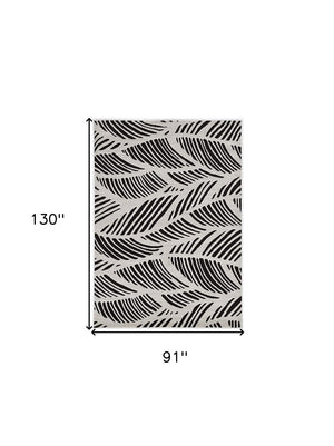 HomeRoots 5' Black and White Abstract Area Rug - Stylish Indoor/Outdoor Decorative Accent for High-Traffic Spaces 8' x 11' 375012