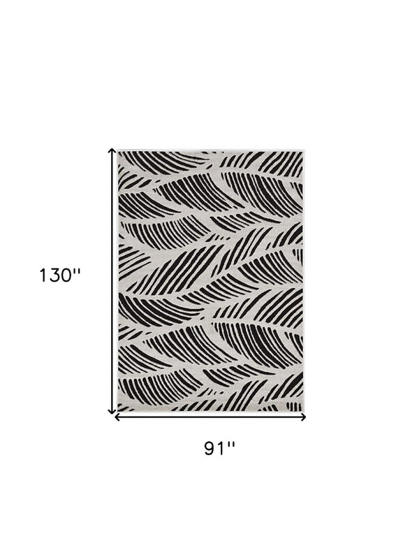 HomeRoots 5' Black and White Abstract Area Rug - Stylish Indoor/Outdoor Decorative Accent for High-Traffic Spaces 8' x 11' 375012