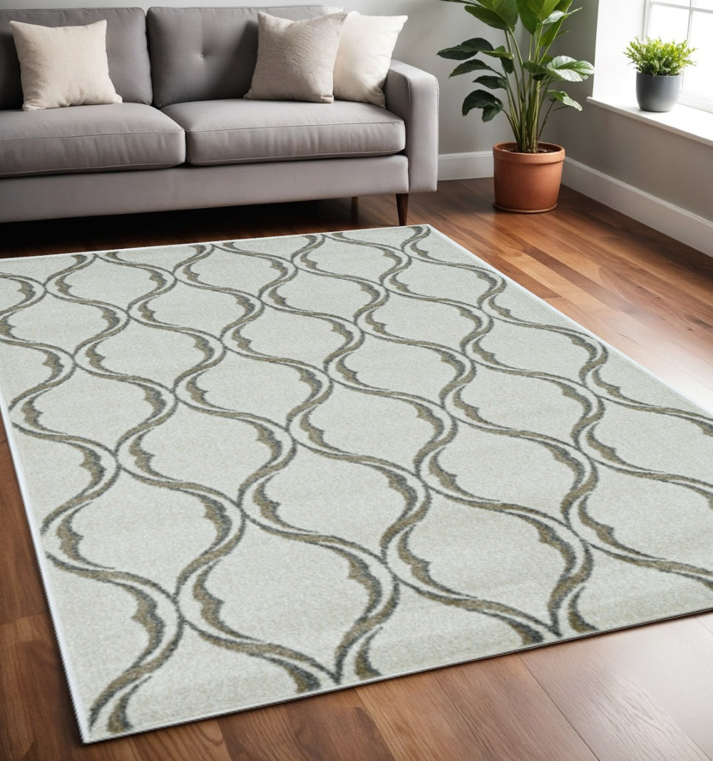 HomeRoots 5' Contemporary Sand and Green Ogee Area Rug – Stylish, Durable, and Versatile for Any Space 5' X 8' 375015