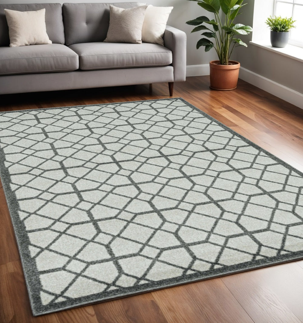HomeRoots 5' Elegant Geometric Tile Area Rug for Indoor and Outdoor Spaces - Durable, Stylish, and Easy Care 5" x 8" 375025