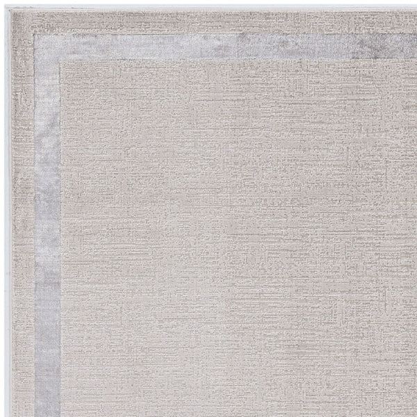 HomeRoots 7' Ivory and Silver Abstract Area Rug - Contemporary Elegance, Stain-Resistant, Easy-Care Design 7' X 10' 375035