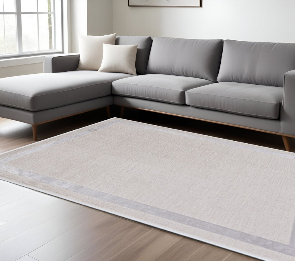 HomeRoots 7' Ivory and Silver Abstract Area Rug - Contemporary Elegance, Stain-Resistant, Easy-Care Design 7' X 10' 375035