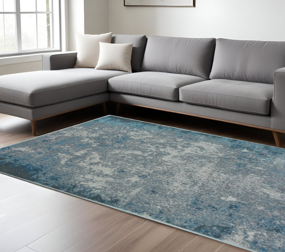 HomeRoots 8' Blue and Silver Abstract Area Rug - Modern Elegance for Living Room, Bedroom, or Office Spaces 8' X 11' 375045