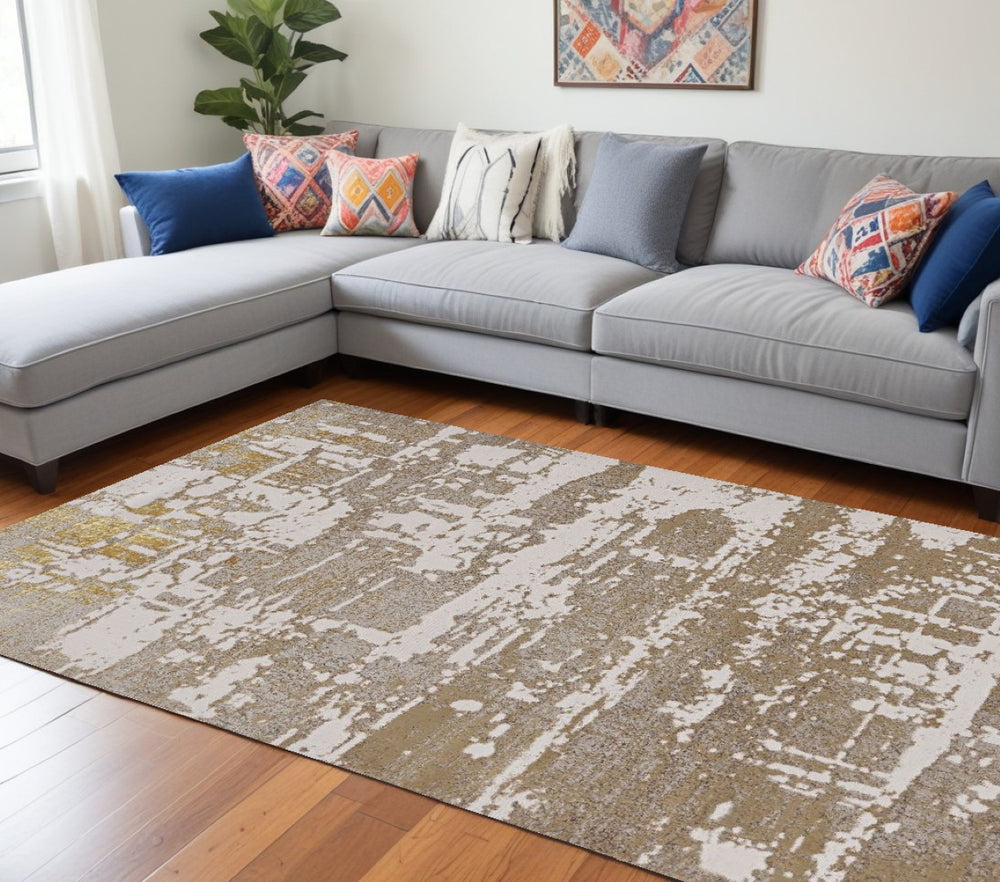 HomeRoots 3' Ivory Taupe and Gold Abstract Area Rug - Elegant, Durable Design for Modern Homes and Spaces 8' X 11' 375050