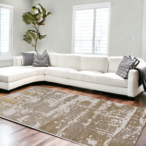 Homeroots 10' X 13' Ivory Gold Machine Woven Abstract Indoor Area Rug  Polypropylene 375051