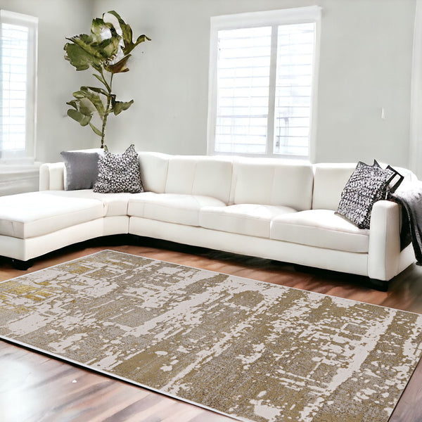 Homeroots 10' X 13' Ivory Gold Machine Woven Abstract Indoor Area Rug  Polypropylene 375051