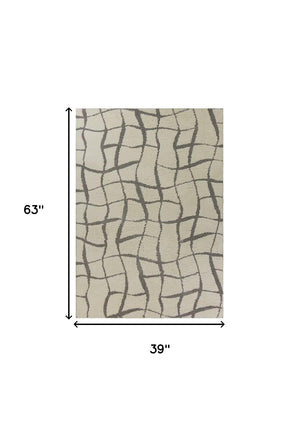 Homeroots 3' X 5' Ivory Abstract Shag Area Rug  Synthetic 375155