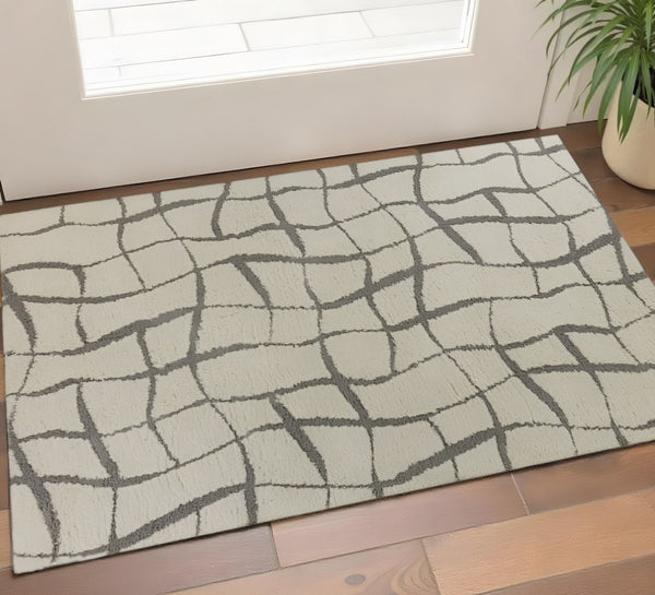 HomeRoots 3' 3" Modern Abstract Ivory and Dark Gray Shag Area Rug - Plush Comfort for Stylish Spaces 3' X 5' 375155