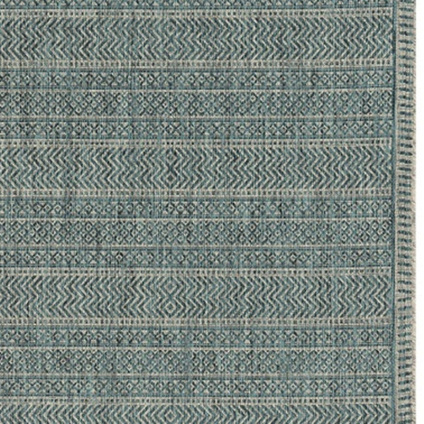 HomeRoots 5' Teal Blue Southwestern Area Rug - Durable Indoor Outdoor Design for Vibrant Spaces & Easy Care 5' x 8' 375205