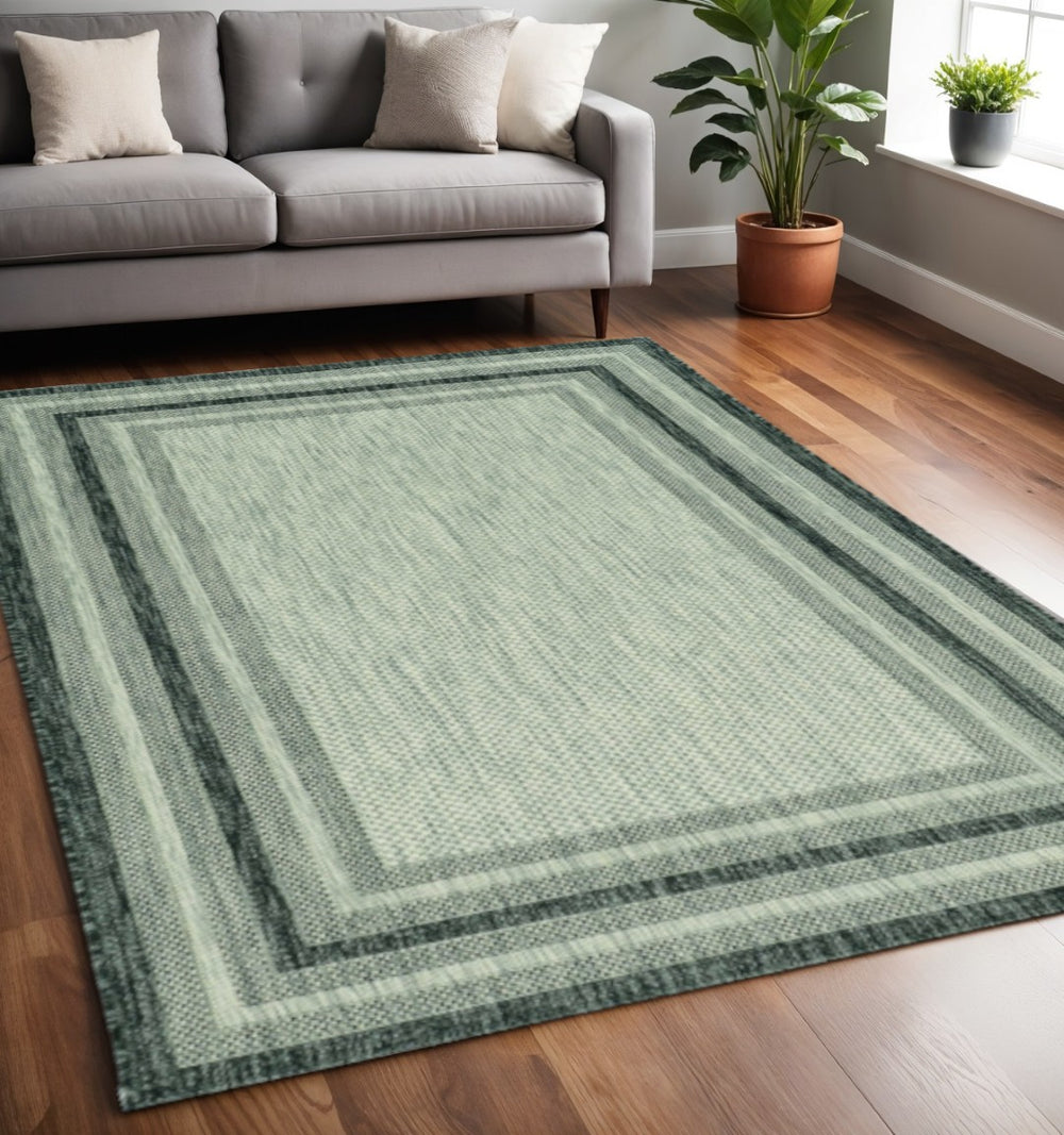 HomeRoots 5' Modern Grey Bordered Area Rug - Durable, Stylish, Machine-Woven for Indoor and Outdoor Spaces 5" x 8" 375210