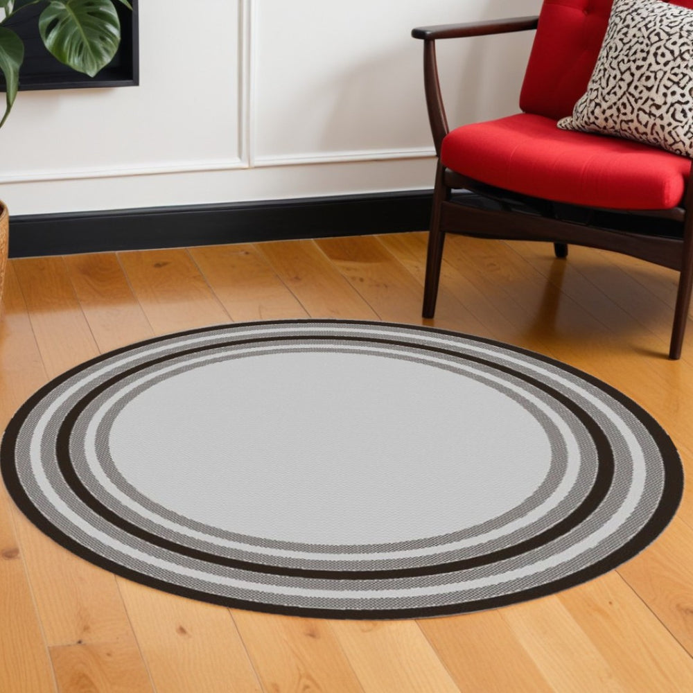 HomeRoots 8' Gray Striped Indoor Outdoor Area Rug - Stylish, Durable, and Versatile for Any Space or Occasion 8' Round 375212