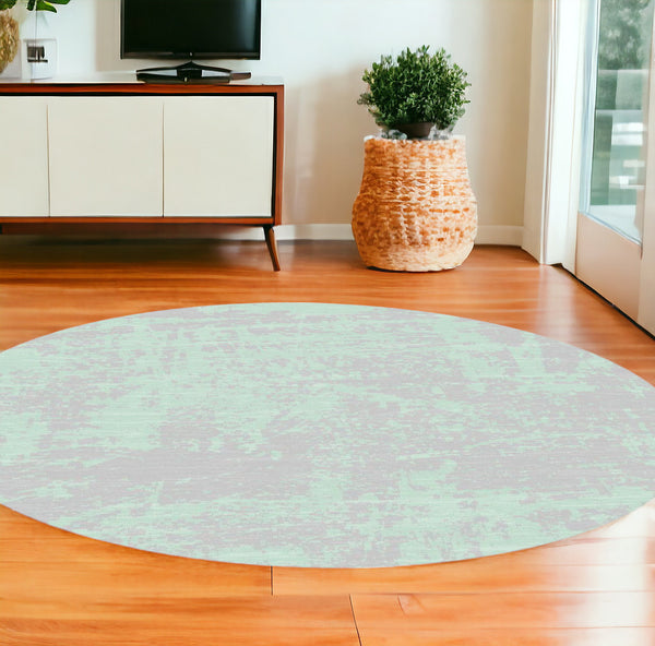 Homeroots 8' Round Blue And Green Round Abstract Indoor Outdoor Area Rug  Polypropylene 375217