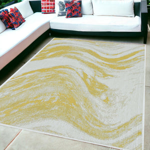 HomeRoots 5' Gold and Ivory Abstract Area Rug - Stylish Indoor/Outdoor Design for Modern Spaces and Durability 5' x 8' 375234