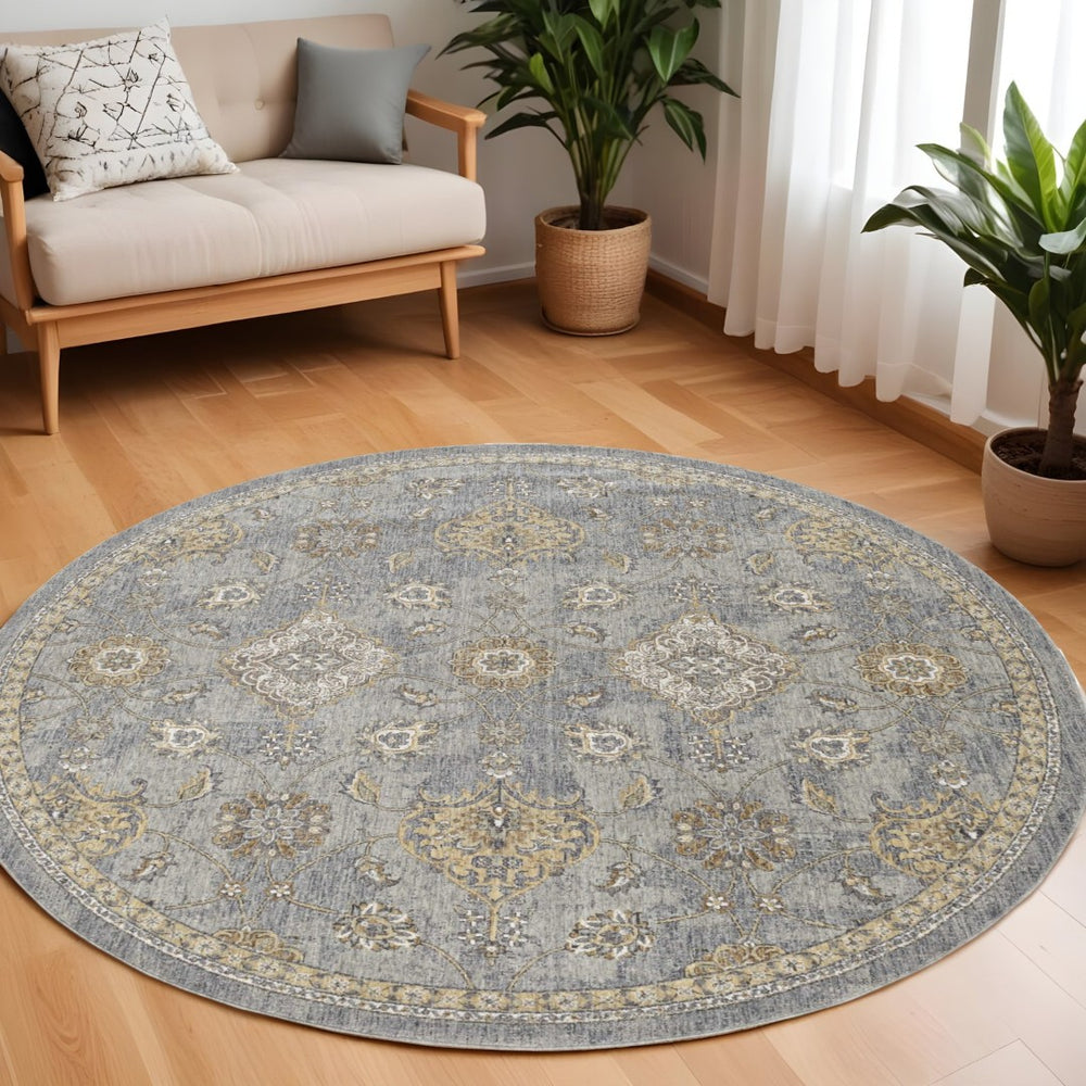 HomeRoots 9' Wool Floral Distressed Rug in Sage, Orange, and Gray - Timeless Elegance for Any Space 9' Round 375275