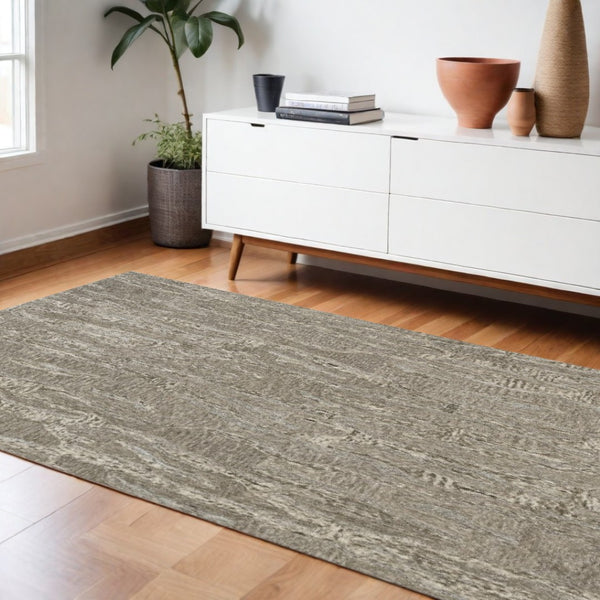 HomeRoots 9' Wool Abstract Area Rug - Hand-Tufted, Soft Sand and Gray Design for Modern Living Spaces 9' X 12' 375358