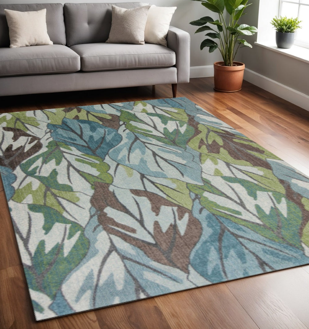 HomeRoots 5' Botanical Leaves Area Rug in Ivory, Blue & Green - Soft, Durable, Stain-Resistant for Any Space 5' X 8' 375508