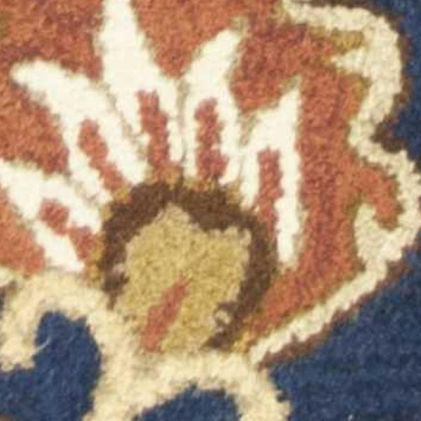 HomeRoots 7' Hand-Tufted Wool Runner Rug in Navy Blue with Orange and Brown Medallion Motifs for Warmth 7' Runner 375534