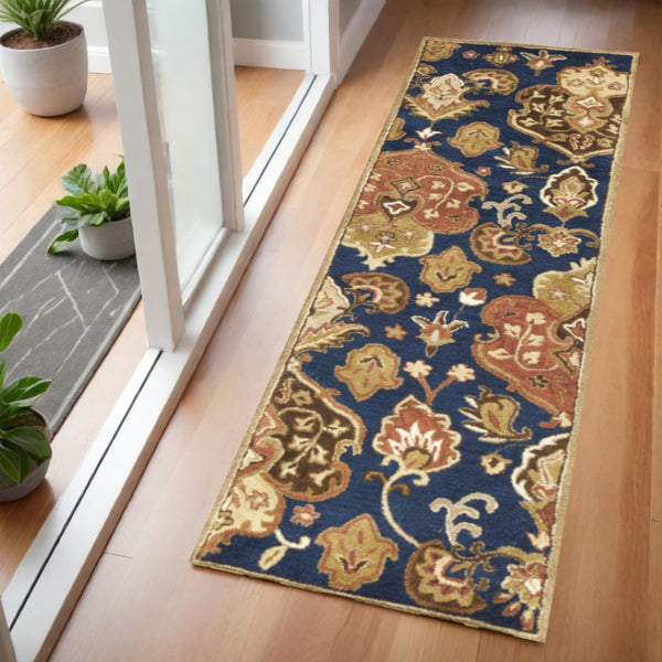 HomeRoots 7' Hand-Tufted Wool Runner Rug in Navy Blue with Orange and Brown Medallion Motifs for Warmth 7' Runner 375534