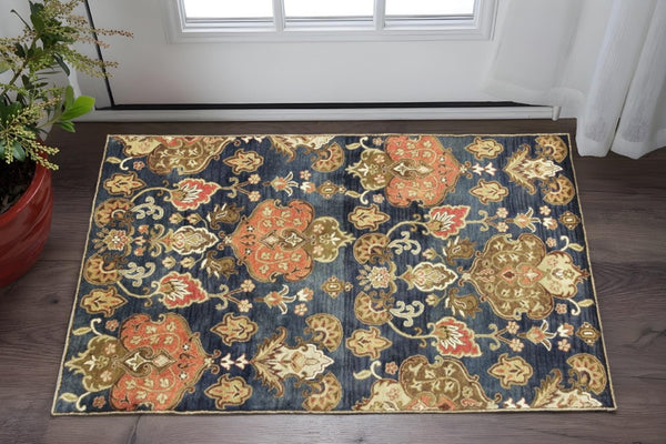 HomeRoots 7' Hand-Tufted Wool Runner Rug in Navy Blue with Orange and Brown Medallion Motifs for Warmth 3' X 5' 375535