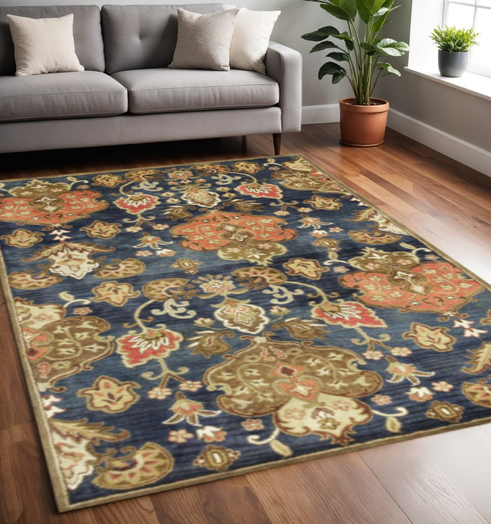 HomeRoots 7' Hand-Tufted Wool Runner Rug in Navy Blue with Orange and Brown Medallion Motifs for Warmth 5' X 8' 375537