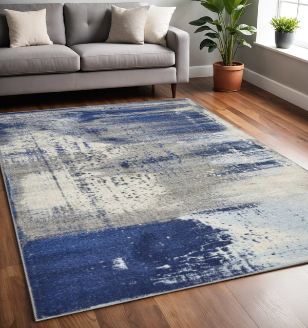 HomeRoots 5' Contemporary Blue Ivory Gray Abstract Area Rug - Durable, Stain-Resistant, Plush Comfort for Homes 5' X 7' 375583