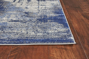 HomeRoots 8' Abstract Shag Area Rug in Blue, Ivory, and Gray - Plush Comfort and Modern Style for Any Room 8' X 10' 375585
