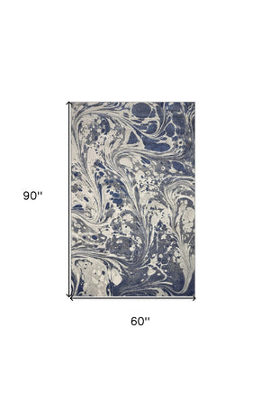 HomeRoots 5' Blue-Gray and Ivory Abstract Area Rug – Modern Style, Soft Texture, Durable for High-Traffic Areas 5' X 8' 375587