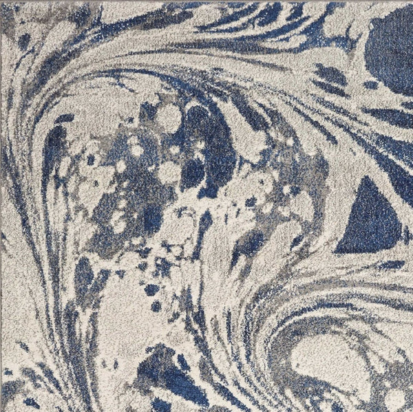 HomeRoots 7' Blue Gray and Ivory Abstract Area Rug – Durable, Stain-Resistant Design for Modern Living Spaces 7' X 9' 375588