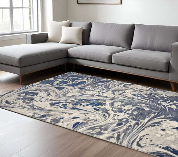 HomeRoots 7' Blue Gray and Ivory Abstract Area Rug – Durable, Stain-Resistant Design for Modern Living Spaces 7' X 9' 375588