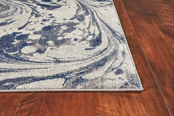 HomeRoots 8' Blue-Gray and Ivory Abstract Area Rug - Modern Art Design for Stylish Living Spaces and Comfort 8' X 10' 375589