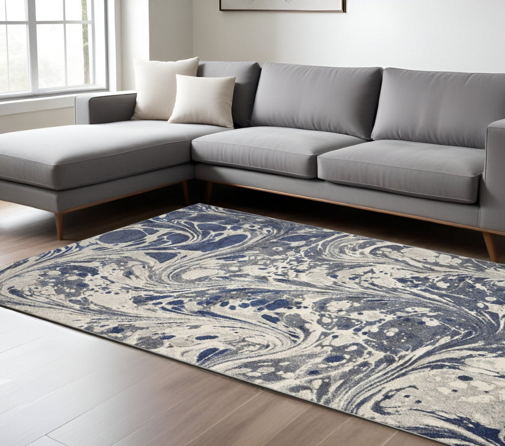 HomeRoots 8' Blue-Gray and Ivory Abstract Area Rug - Modern Art Design for Stylish Living Spaces and Comfort 8' X 10' 375589